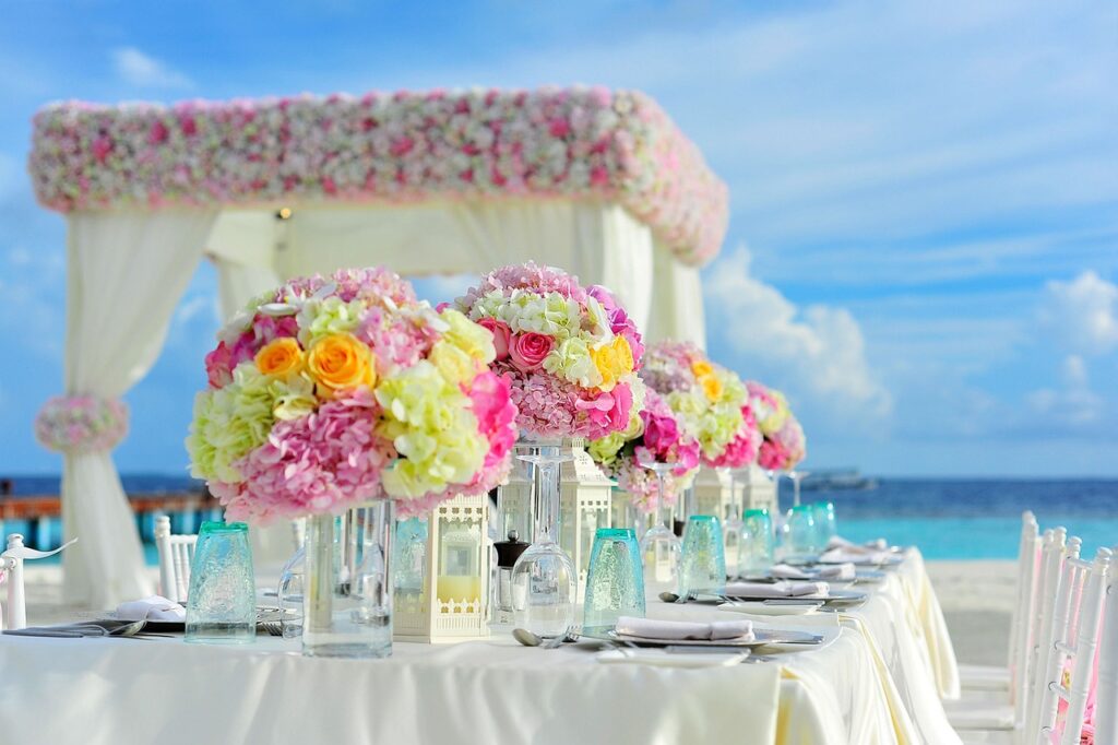 Dante and Simone's wedding ceremony table setup and arrangement on the beach.